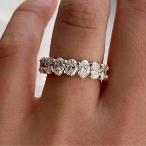 Oval moissanite wedding band/engagement ring. 5x3 mm. 14k yellow gold